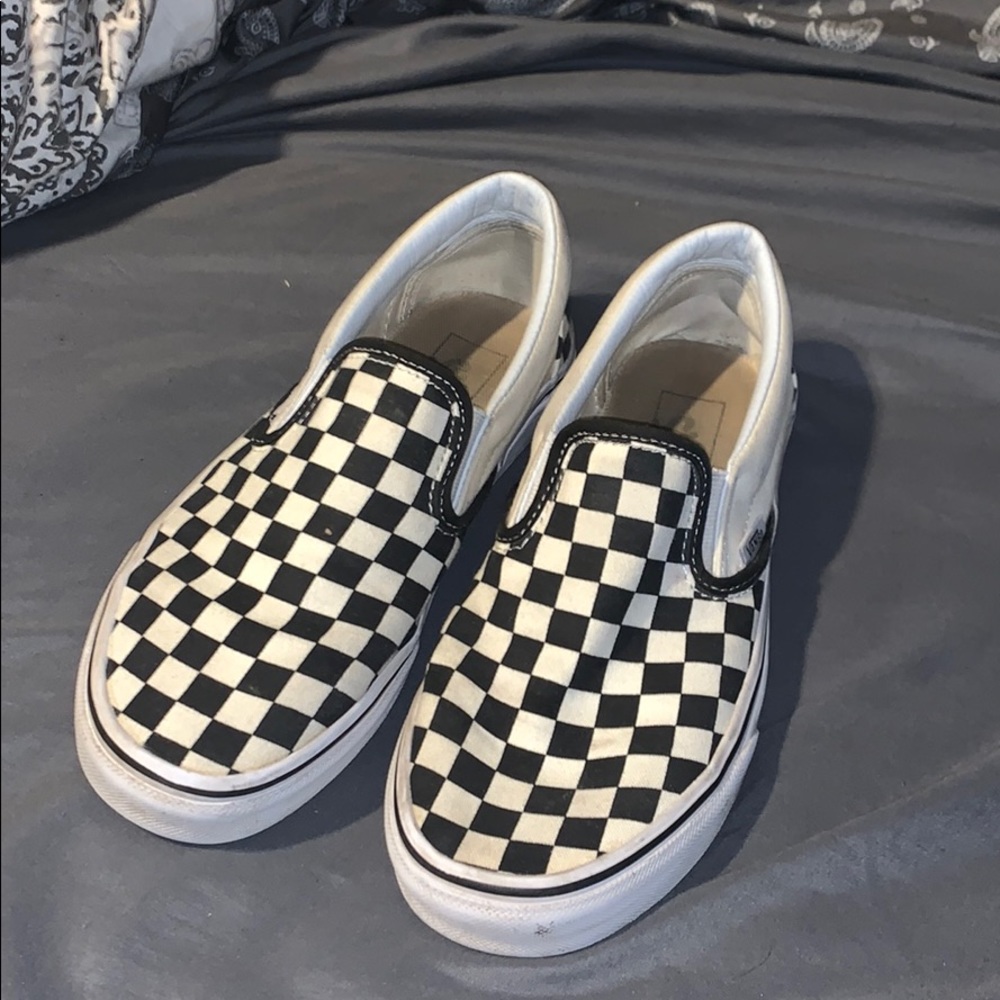 Black and white checkered slip on vans
